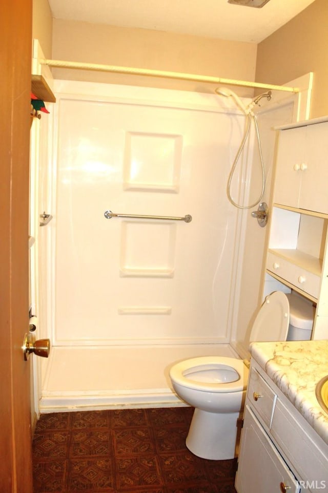 4283 E Ramp Creek Rd, Bloomington, IN 47401 - full bathroom with vanity, toilet, tub / shower combination, and tile patterned floors