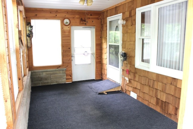 4283 E Ramp Creek Rd, Bloomington, IN 47401 - carpeted spare room with wooden walls