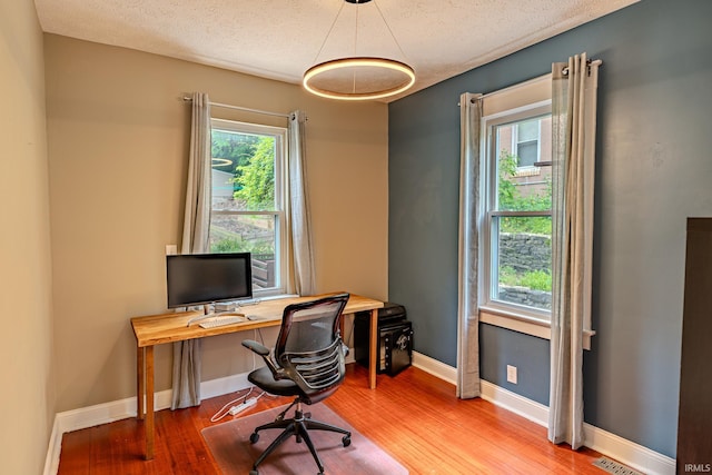 413 Lingle Ave, Lafayette, IN 47901 - office featuring plenty of natural light, a textured ceiling, and wood finished floors