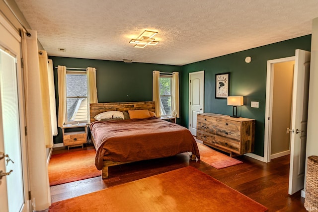 413 Lingle Ave, Lafayette, IN 47901 - bedroom with wood finished floors, a textured ceiling, and baseboards