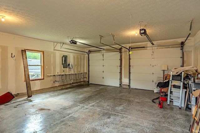 413 Lingle Ave, Lafayette, IN 47901 - garage featuring electric panel and a garage door opener