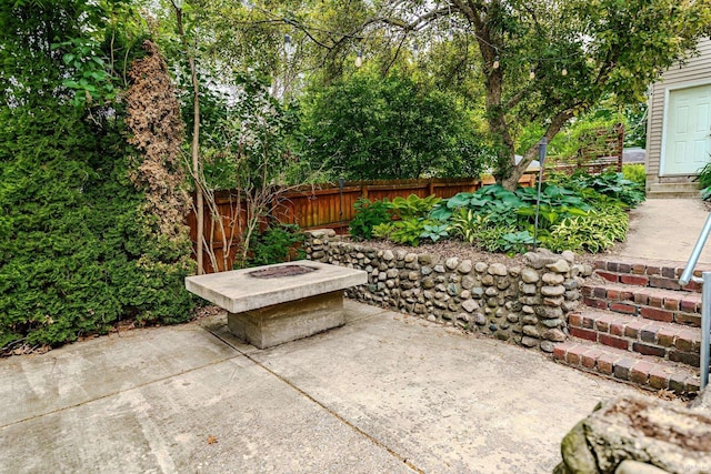 413 Lingle Ave, Lafayette, IN 47901 - fenced backyard with a patio area