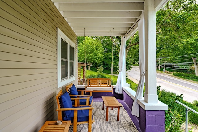413 Lingle Ave, Lafayette, IN 47901 - covered porch featuring an outdoor living space