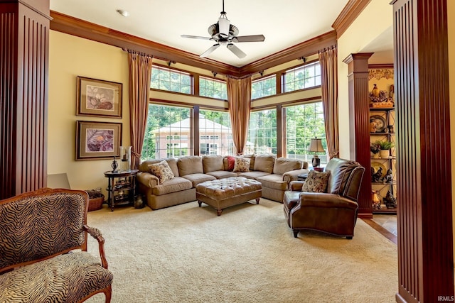 136 Tulip Cir, Bremen, IN 46506 - carpeted living room with ornamental molding, ceiling fan, plenty of natural light, and a high ceiling