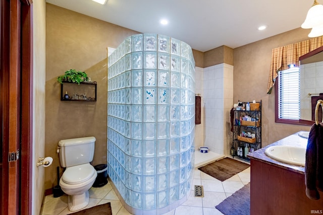 136 Tulip Cir, Bremen, IN 46506 - bathroom with toilet, tile patterned floors, walk in shower, and vanity