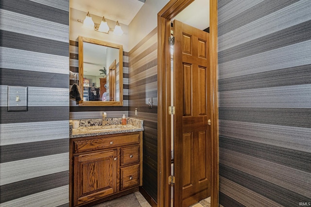 136 Tulip Cir, Bremen, IN 46506 - bathroom with wallpapered walls and vanity