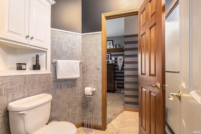 136 Tulip Cir, Bremen, IN 46506 - half bath featuring toilet and tile patterned flooring