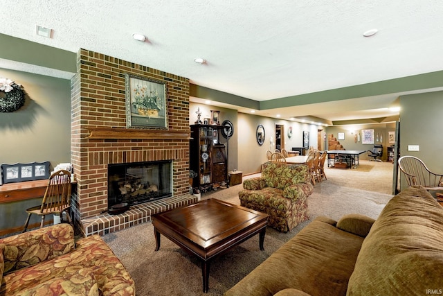 136 Tulip Cir, Bremen, IN 46506 - living room featuring carpet flooring, a fireplace, baseboards, recessed lighting, and a textured ceiling