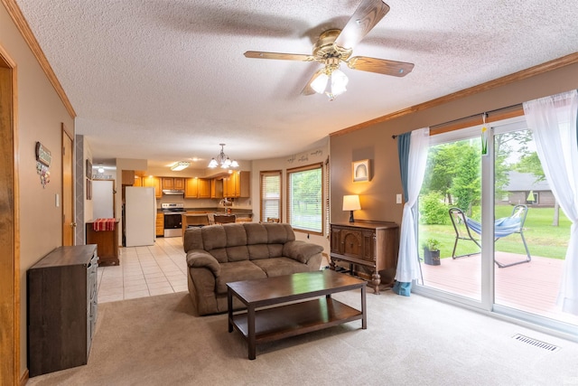 620 Bob Ct, Evansville, IN 47711 - living room with a textured ceiling, light carpet, crown molding, a chandelier, and a ceiling fan