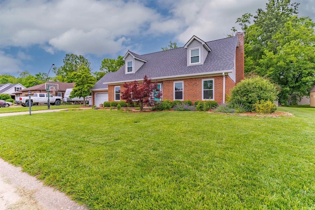 620 Bob Ct, Evansville, IN 47711 - new england style home featuring a chimney, an attached garage, brick siding, concrete driveway, and a front yard