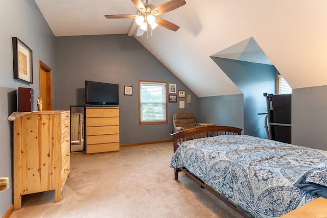 620 Bob Ct, Evansville, IN 47711 - bedroom with multiple windows, light colored carpet, vaulted ceiling, a ceiling fan, and baseboards