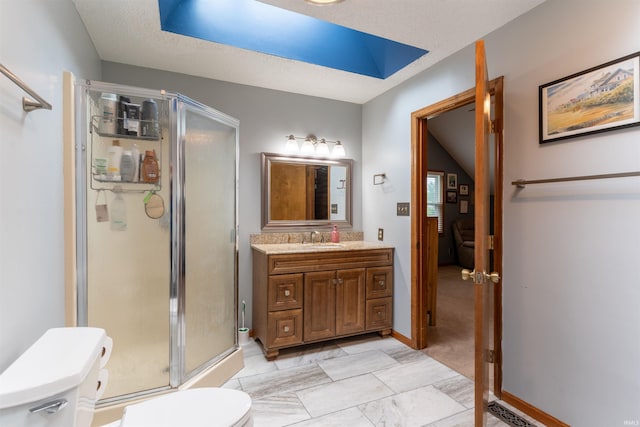 620 Bob Ct, Evansville, IN 47711 - full bath with toilet, a stall shower, vanity, and baseboards