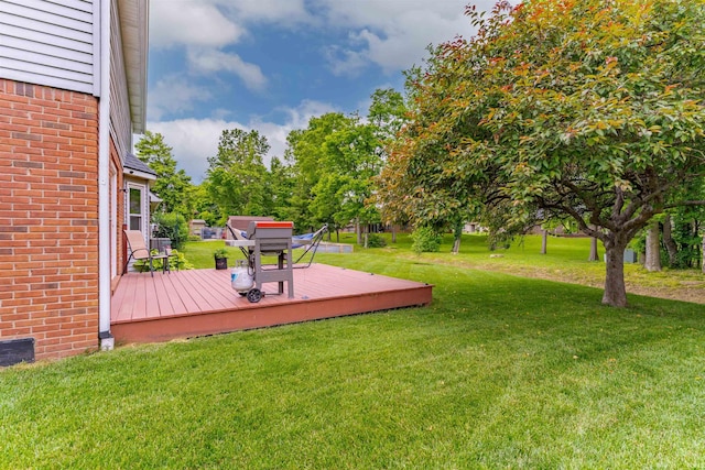 620 Bob Ct, Evansville, IN 47711 - view of green lawn with a deck
