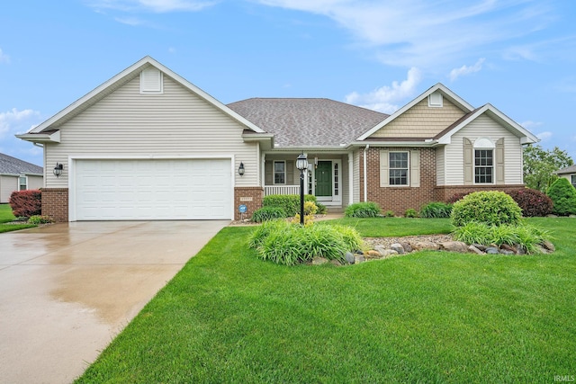 57772 Fall Creek Dr, Goshen, IN 46528 - view of front of house with brick siding, concrete driveway, a front yard, a garage, and a porch