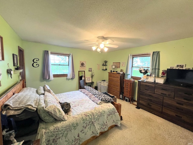 3165 E 300 S Rd, Washington, IN 47501 - carpeted bedroom featuring a ceiling fan and a textured ceiling