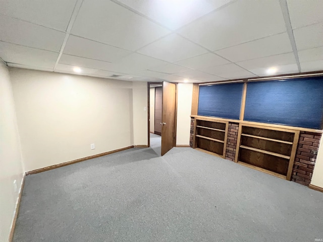 3165 E 300 S Rd, Washington, IN 47501 - finished below grade area featuring baseboards, carpet floors, and a paneled ceiling