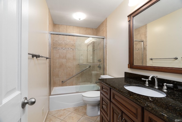 1804 Bent Tree Trl, West Lafayette, IN 47906 - bathroom with vanity, tile patterned floors, enclosed tub / shower combo, and toilet