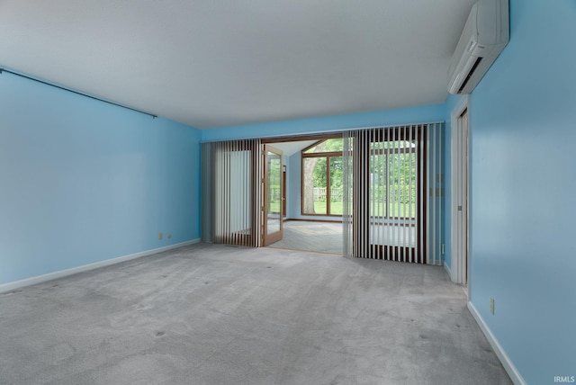 1804 Bent Tree Trl, West Lafayette, IN 47906 - empty room with a wall unit AC, carpet flooring, and baseboards