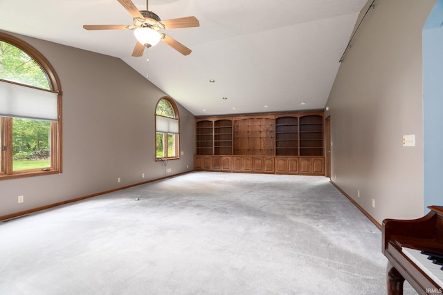 1804 Bent Tree Trl, West Lafayette, IN 47906 - unfurnished living room with light carpet, built in features, baseboards, vaulted ceiling, and ceiling fan