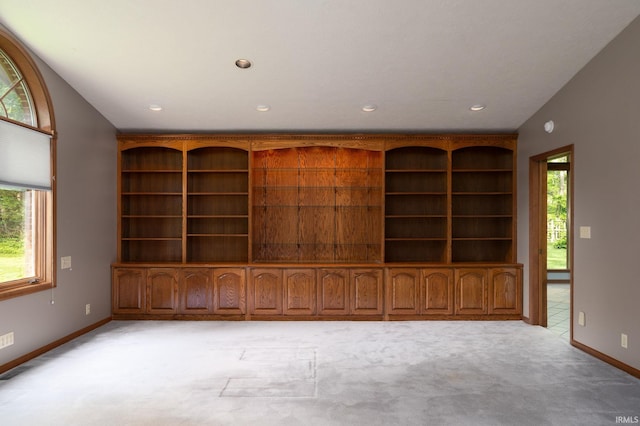 1804 Bent Tree Trl, West Lafayette, IN 47906 - unfurnished living room featuring light colored carpet, healthy amount of natural light, baseboards, and recessed lighting