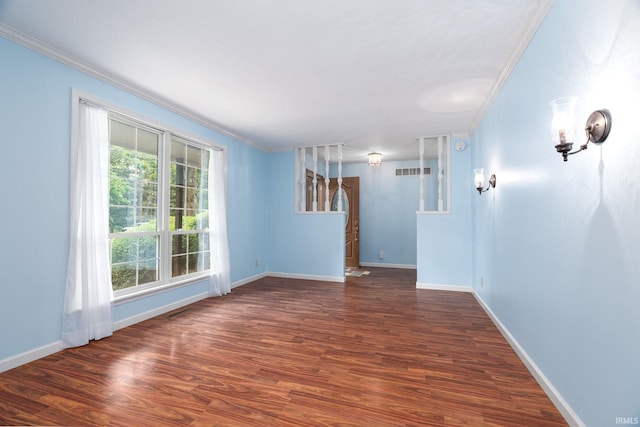 1804 Bent Tree Trl, West Lafayette, IN 47906 - spare room with crown molding, wood finished floors, and baseboards