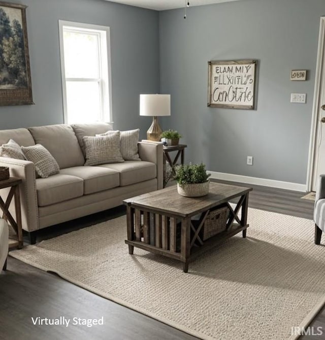 504 V St, Bedford, IN 47421 - living room with dark wood-type flooring and baseboards
