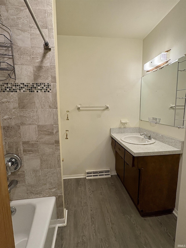 141 Indian Rock Dr, West Lafayette, IN 47906 - full bathroom featuring vanity, wood finished floors, shower / bathtub combination, and baseboards