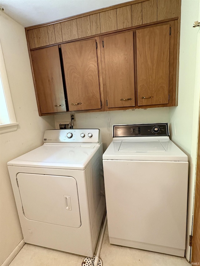 141 Indian Rock Dr, West Lafayette, IN 47906 - washroom featuring cabinet space and washer and clothes dryer