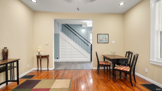 1018 Loree St, Fort Wayne, IN 46805 - dining area featuring hardwood / wood-style flooring, stairway, baseboards, recessed lighting, and ceiling fan