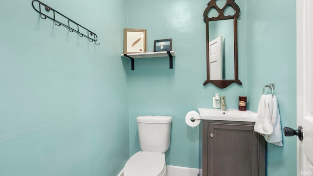 1018 Loree St, Fort Wayne, IN 46805 - bathroom featuring vanity, toilet, and baseboards
