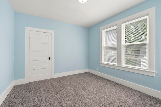 1018 Loree St, Fort Wayne, IN 46805 - spare room featuring carpet and baseboards