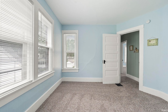 1018 Loree St, Fort Wayne, IN 46805 - unfurnished bedroom featuring carpet flooring and baseboards