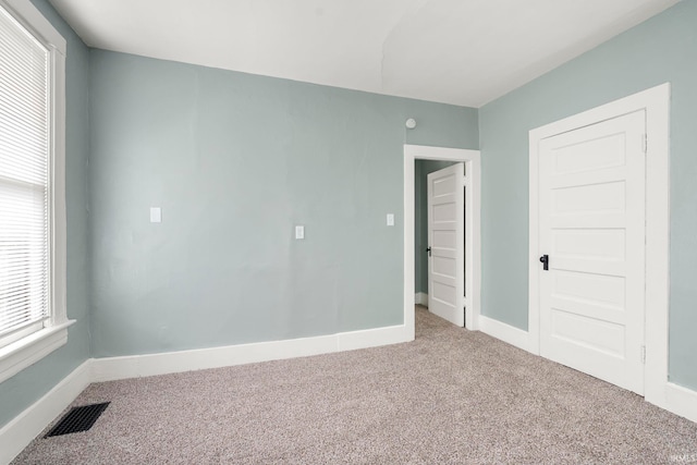 1018 Loree St, Fort Wayne, IN 46805 - carpeted spare room with baseboards