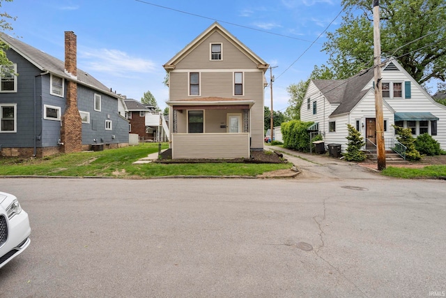 1018 Loree St, Fort Wayne, IN 46805 - view of front of house with a front lawn and a residential view