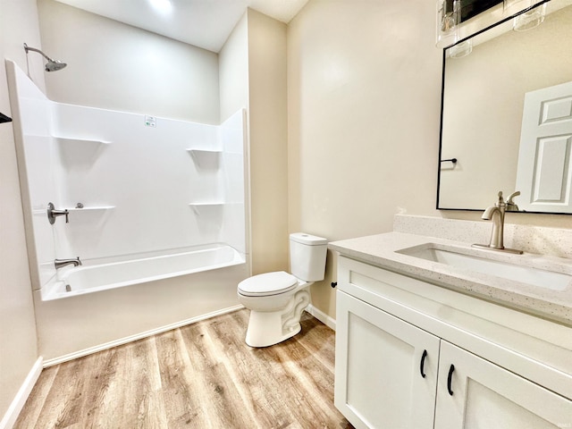 2416 S Woodland Trl, Warsaw, IN 46580 - full bathroom with shower / bath combination, toilet, vanity, and wood finished floors
