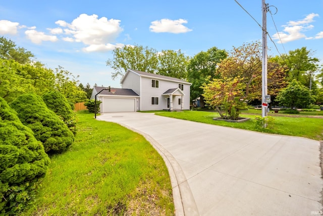 2416 S Woodland Trl, Warsaw, IN 46580 - view of front of property with driveway and a garage