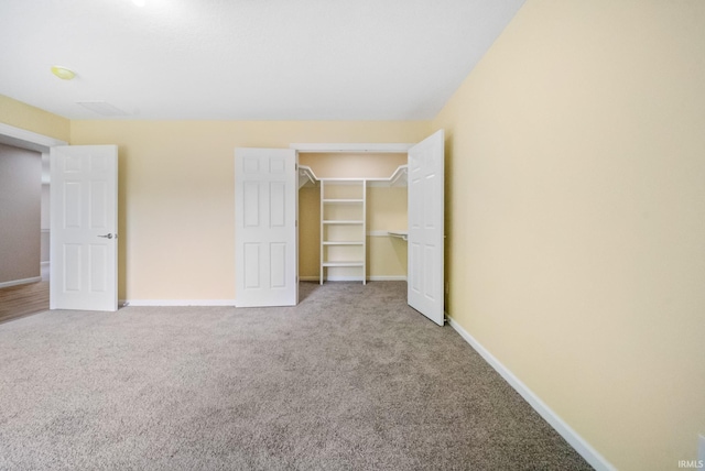 2416 S Woodland Trl, Warsaw, IN 46580 - unfurnished bedroom with carpet flooring, baseboards, and a closet
