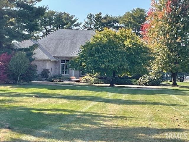 10872 N 875 E, Otterbein, IN 47970 - view of front of house featuring a front lawn