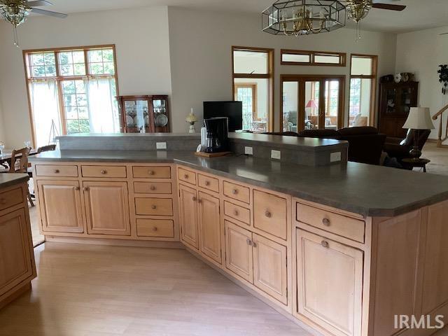 10872 N 875 E, Otterbein, IN 47970 - kitchen featuring a ceiling fan, open floor plan, light brown cabinets, and light wood-type flooring