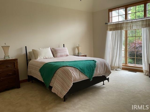 10872 N 875 E, Otterbein, IN 47970 - bedroom featuring carpet floors and baseboards