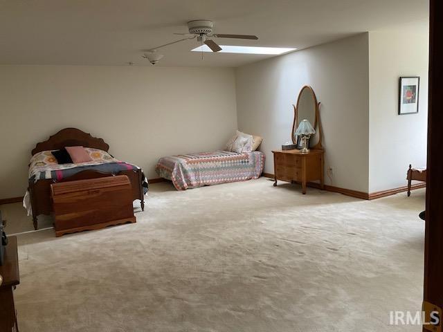 10872 N 875 E, Otterbein, IN 47970 - bedroom with carpet, a ceiling fan, and baseboards