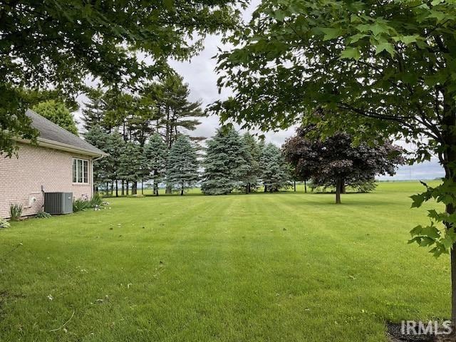 10872 N 875 E, Otterbein, IN 47970 - view of green lawn with central air condition unit