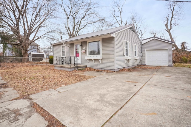 123 S Race St, Princeton, IN 47670 - view of front of home featuring a detached garage, driveway, and an outdoor structure