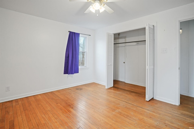 123 S Race St, Princeton, IN 47670 - unfurnished bedroom featuring light wood-style floors, a closet, and baseboards