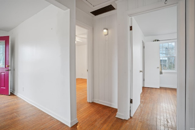 123 S Race St, Princeton, IN 47670 - hall with light wood-style floors, baseboards, and attic access
