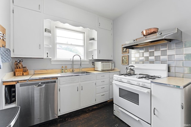 4325 S Wayne Ave, Fort Wayne, IN 46807 - kitchen with white appliances, a sink, under cabinet range hood, dark wood finished floors, and white cabinets