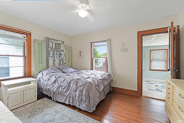 4325 S Wayne Ave, Fort Wayne, IN 46807 - bedroom with wood finished floors, baseboards, and ceiling fan