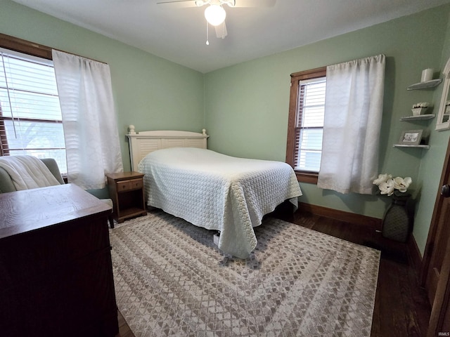 4325 S Wayne Ave, Fort Wayne, IN 46807 - bedroom featuring wood finished floors, baseboards, and a ceiling fan