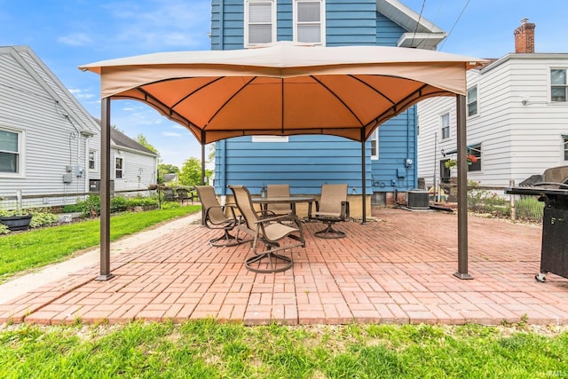 4325 S Wayne Ave, Fort Wayne, IN 46807 - view of patio / terrace with a gazebo, central AC unit, outdoor dining area, and a grill