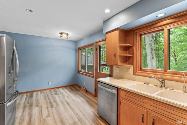 2730 Newman Rd, West Lafayette, IN 47906 - kitchen with stainless steel appliances, healthy amount of natural light, a sink, light countertops, and recessed lighting
